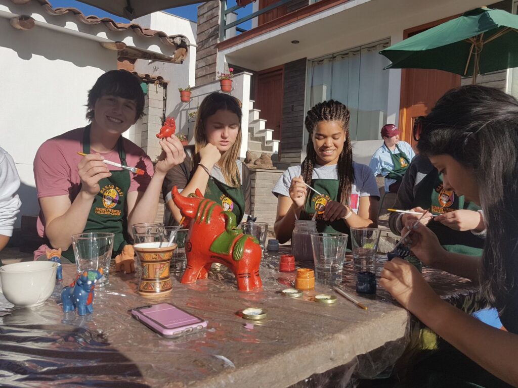 Students making a souvenir at the pottery workshop